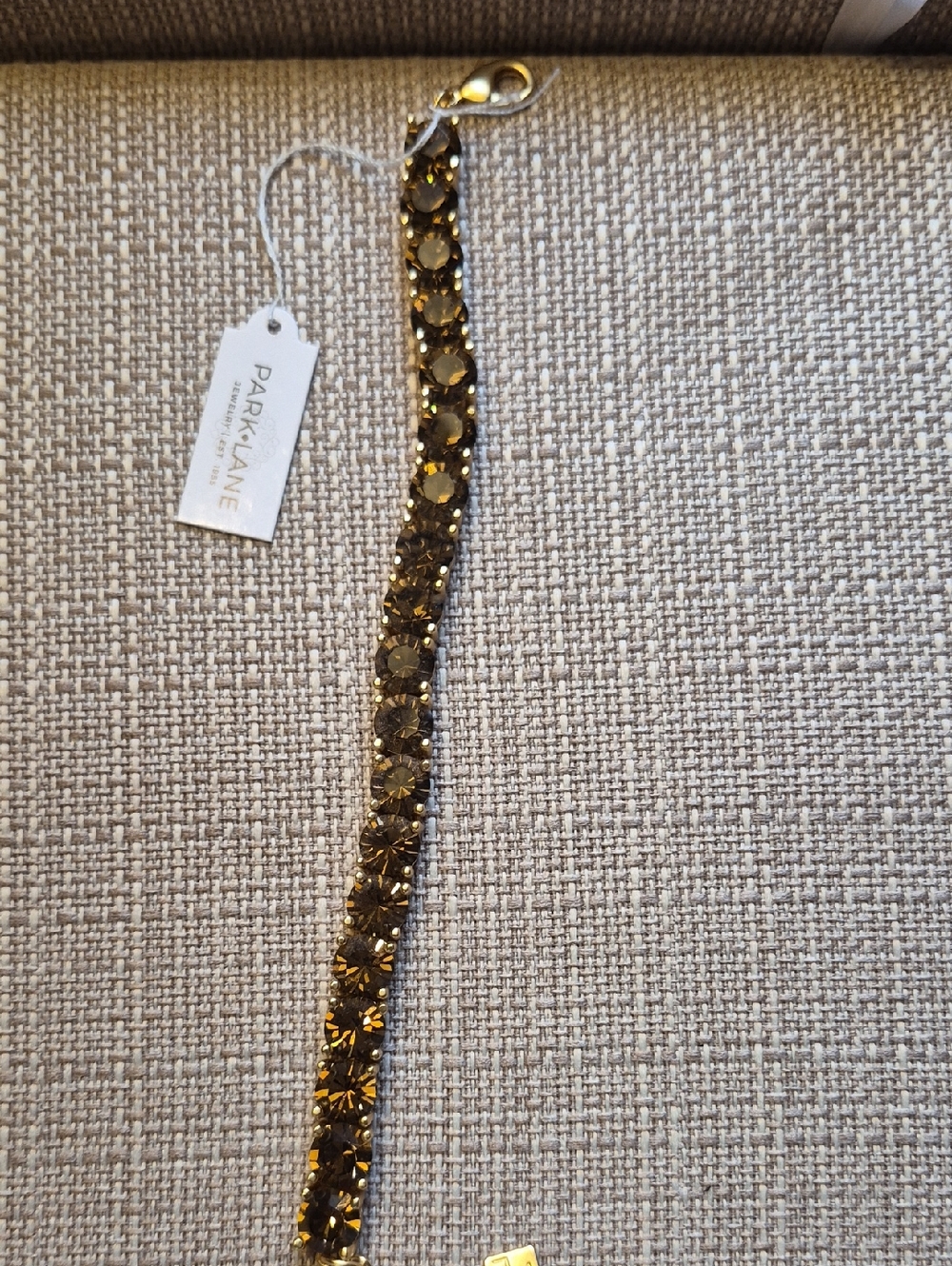 Park Lane Gold Tone Bracelet with Smoky Crystal Row